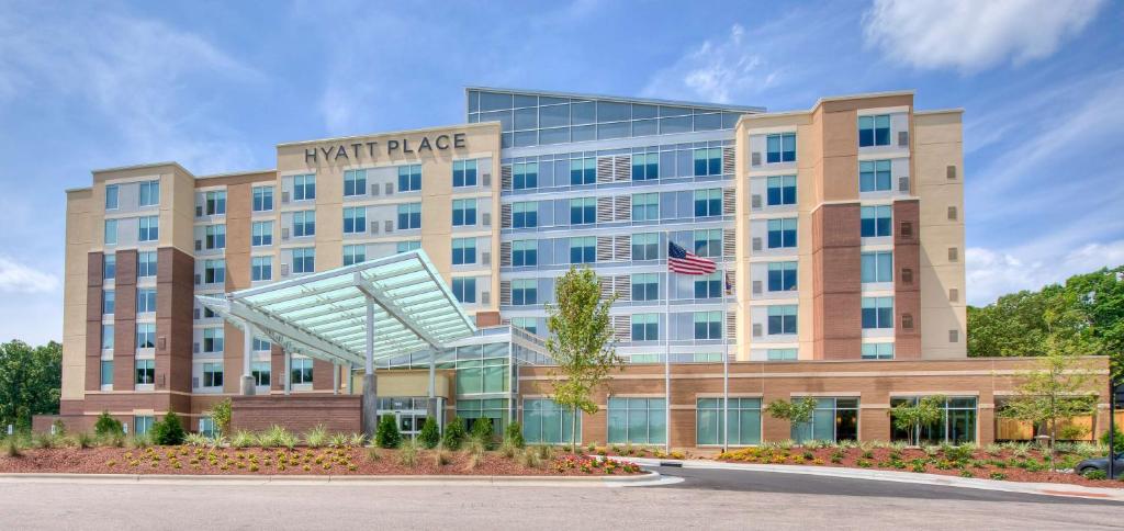 a rendering of a hotel place with an american flag at Hyatt Place Durham Southpoint in Durham