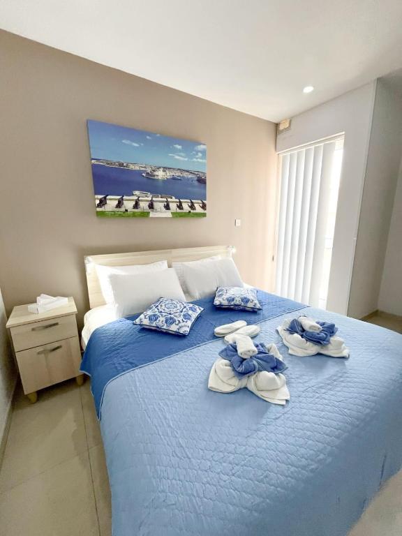 Postel nebo postele na pokoji v ubytování Apartament in Ta' Xbiex 3BR- 3 min Yatch Marina
