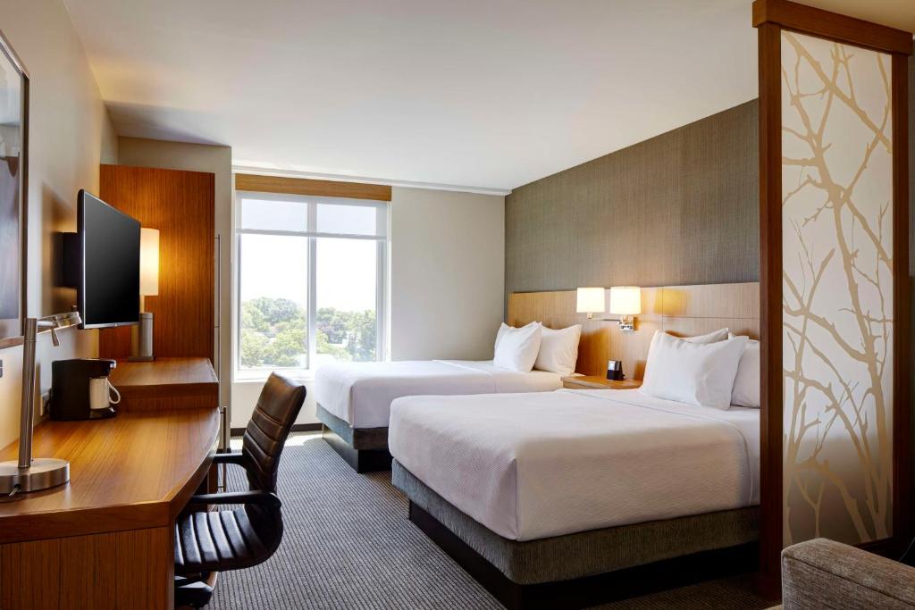 Cama ou camas em um quarto em Hyatt Place New York Yonkers