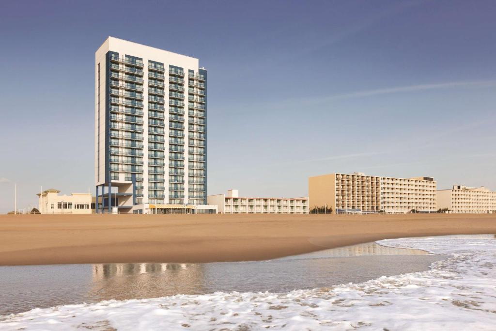 a view of a city with a beach and buildings at Hyatt House Virginia Beach / Oceanfront in Virginia Beach