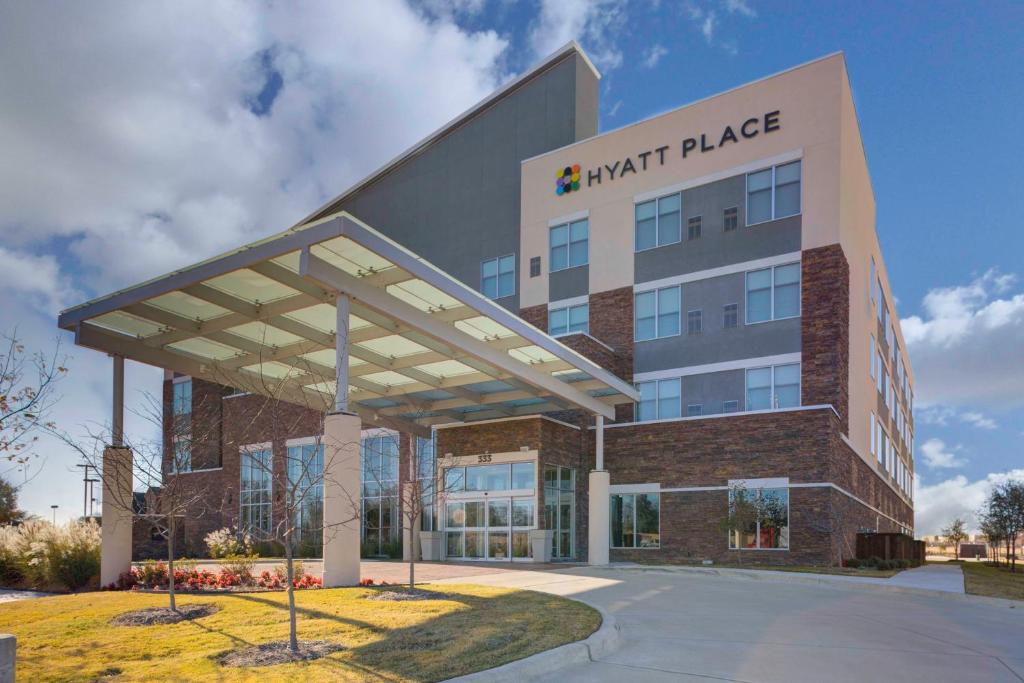 a large building with a sign that readsmtk place at Hyatt Place Dallas/Allen in Allen