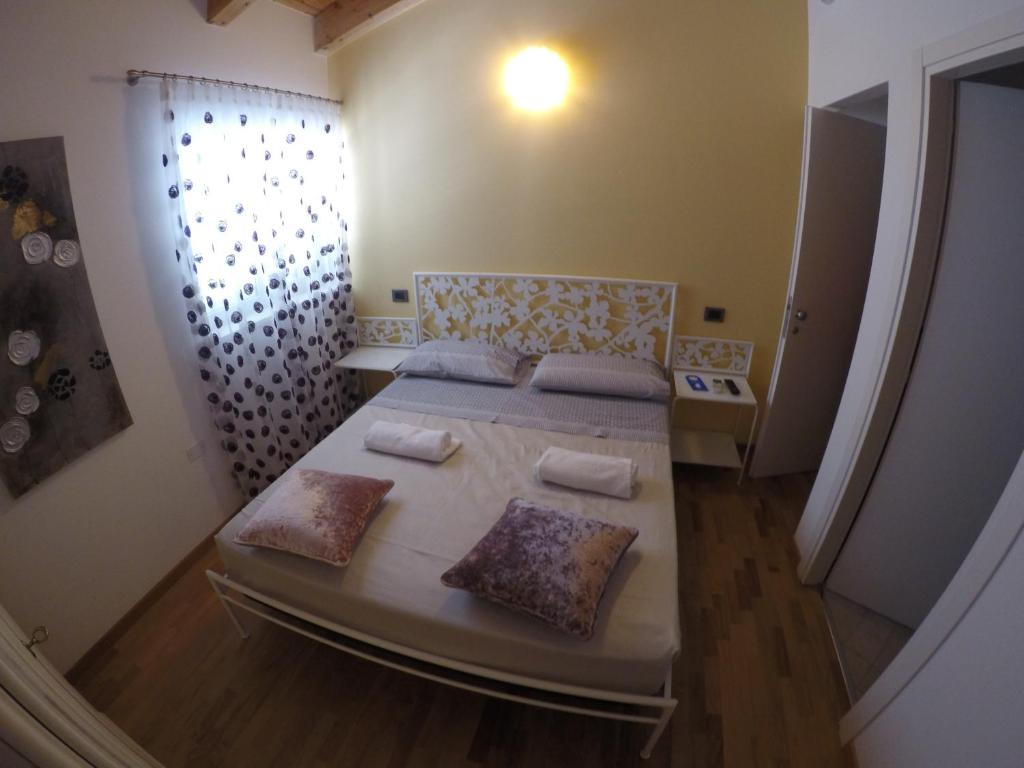 Postel nebo postele na pokoji v ubytování Villa Imago