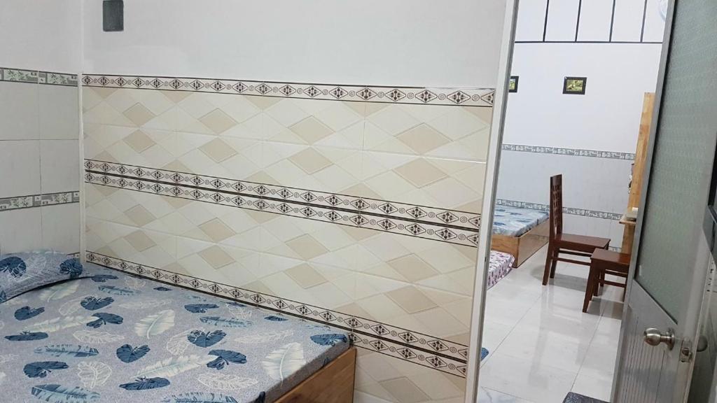 Postel nebo postele na pokoji v ubytování Hoa Lan Motel & Homestay