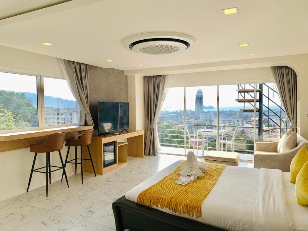 TV a/nebo společenská místnost v ubytování Ocean View Treasure Residence