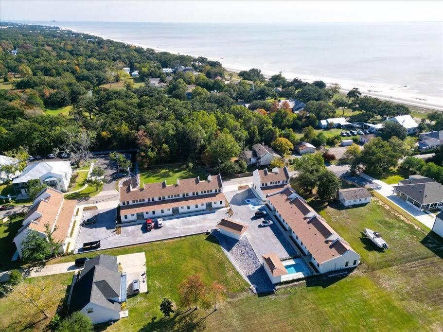 an aerial view of a large house with the ocean at Pass Marianne Town Home in Pass Christian