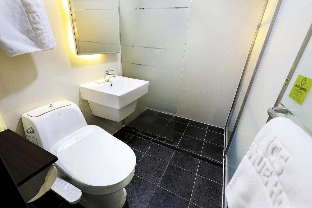 Koupelna v ubytování CS Avenue Tourist Hotel