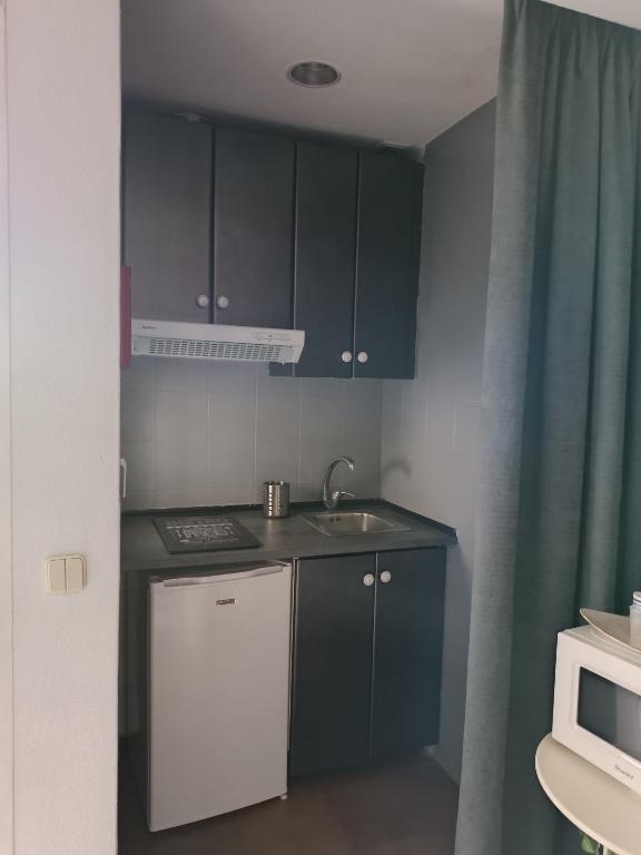 Kuchyň nebo kuchyňský kout v ubytování Apartamento en Puerto Banús