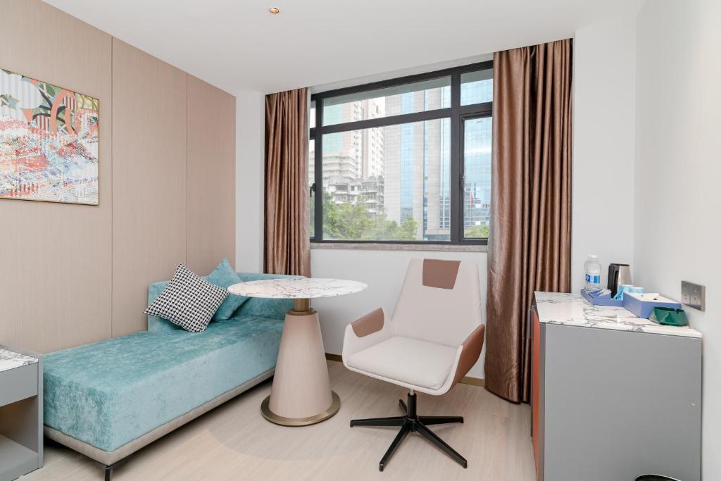 Postel nebo postele na pokoji v ubytování Insail Hotels Guangzhou Beijing Road Pedestrian Branch