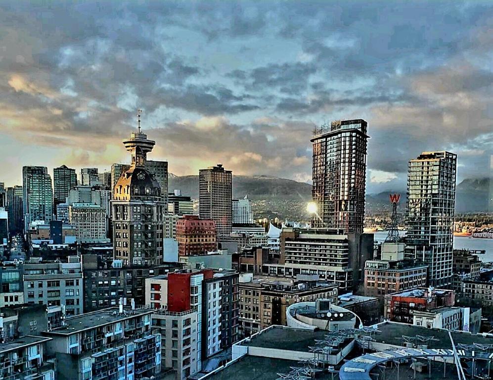 a view of a city with tall buildings at Spring Serene in Vancouver