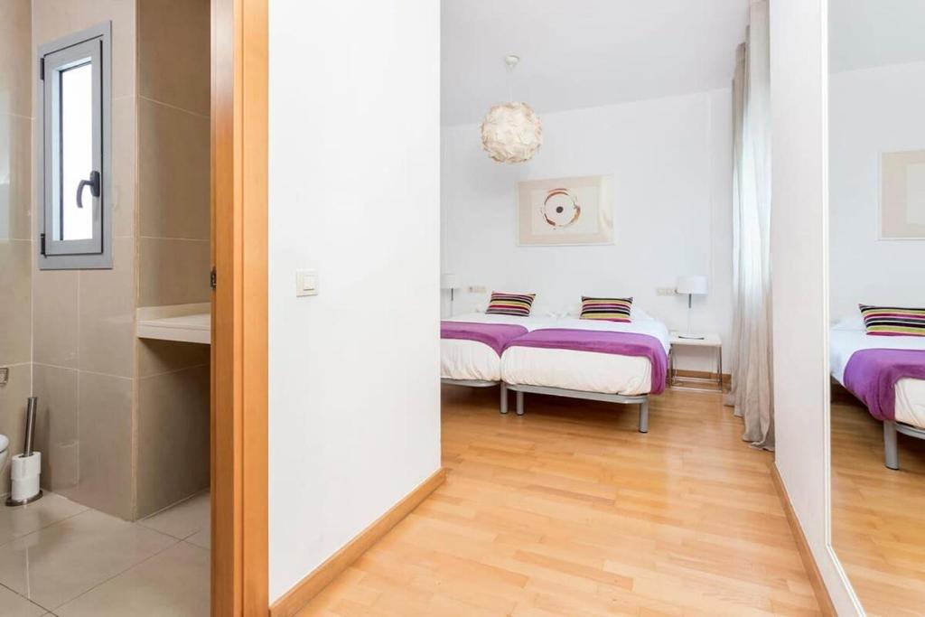 Postel nebo postele na pokoji v ubytování Spacious and Elegant 4 Bedroom with Private Terrace
