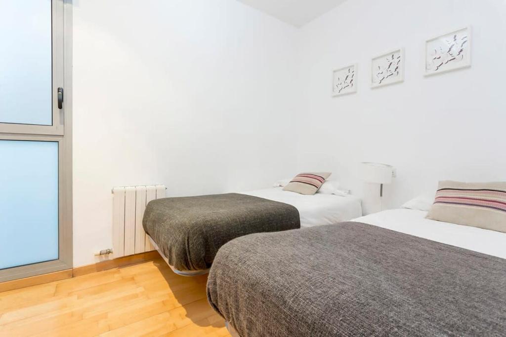 Postel nebo postele na pokoji v ubytování Spacious and Elegant 4 Bedroom with Private Terrace