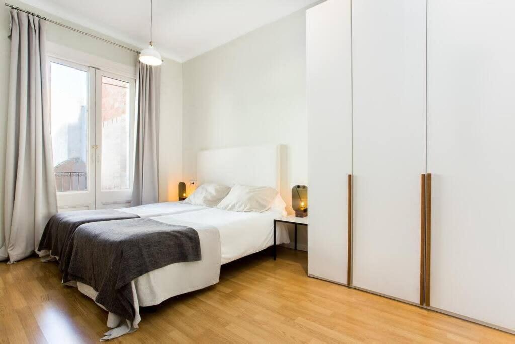 Posteľ alebo postele v izbe v ubytovaní Bright and modern 3bedroom in Las Ramblas 3 1B
