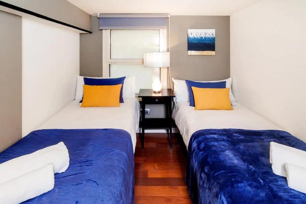 Postel nebo postele na pokoji v ubytování Luxury Duplex Apartment in the Heart of Barcelona