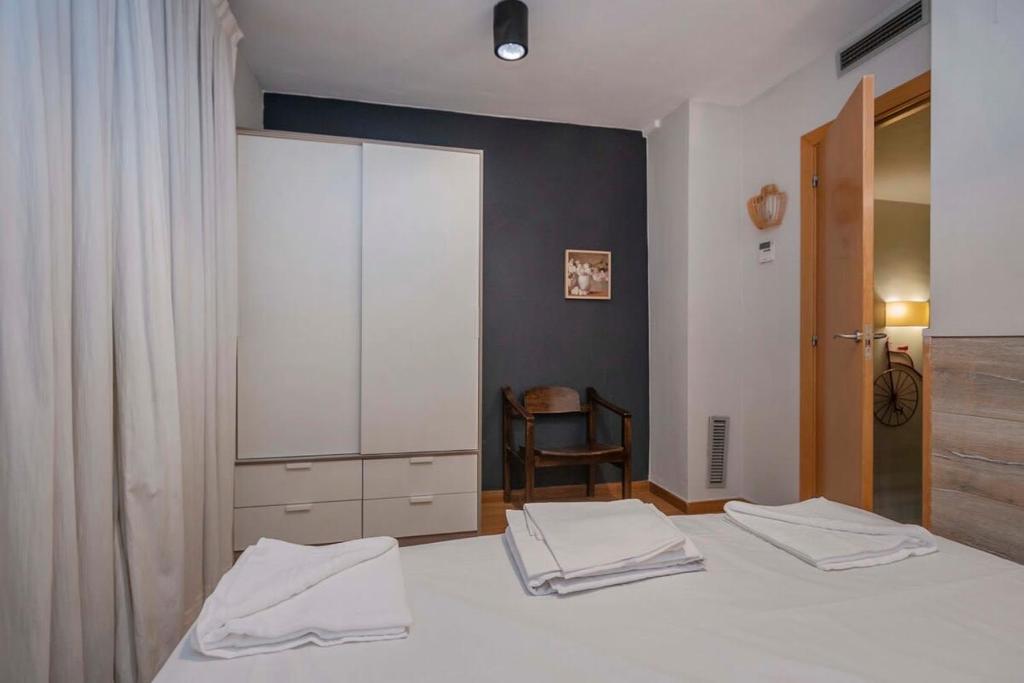 Posteľ alebo postele v izbe v ubytovaní Bright and modern Duplex with terrace in Eixample district P1