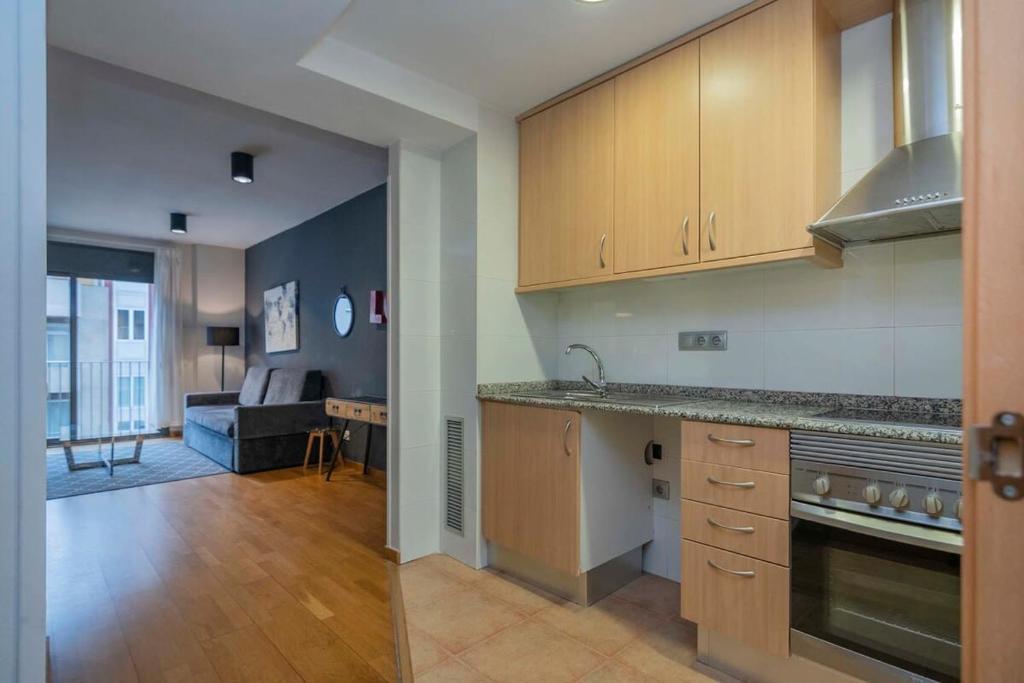Kuchyňa alebo kuchynka v ubytovaní Modern and bright apartment in Eixample 5-2
