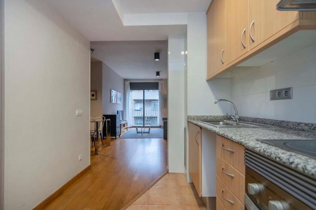 Kuchyňa alebo kuchynka v ubytovaní Modern and bright apartment in Eixample 5-2