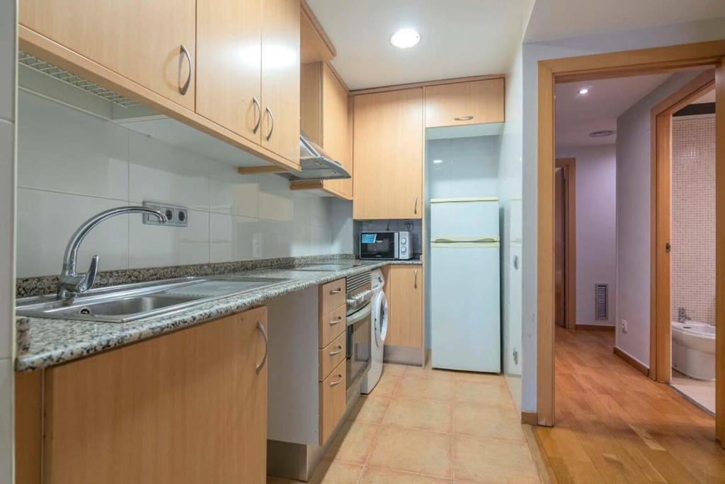 Kuchyňa alebo kuchynka v ubytovaní Modern and bright apartment in Eixample 5-2