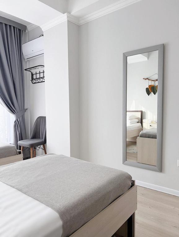 Postel nebo postele na pokoji v ubytování Compass Hostel