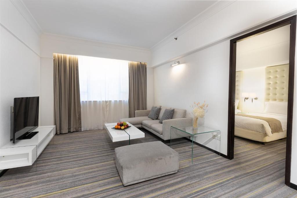 Giường trong phòng chung tại Panda Hotel