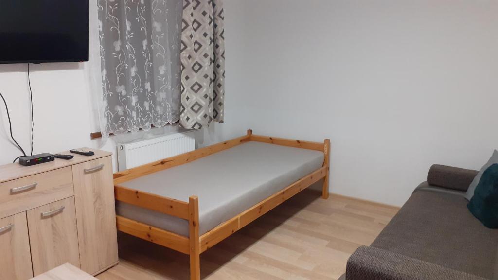 Televízia a/alebo spoločenská miestnosť v ubytovaní Energy House