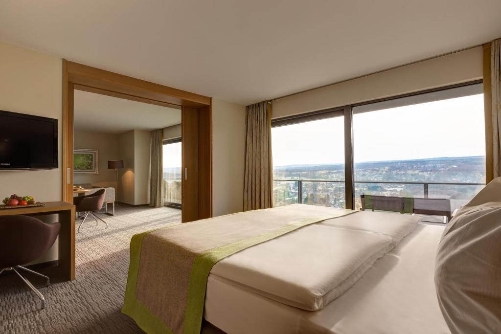 Postel nebo postele na pokoji v ubytování Silva Hotel Spa-Balmoral