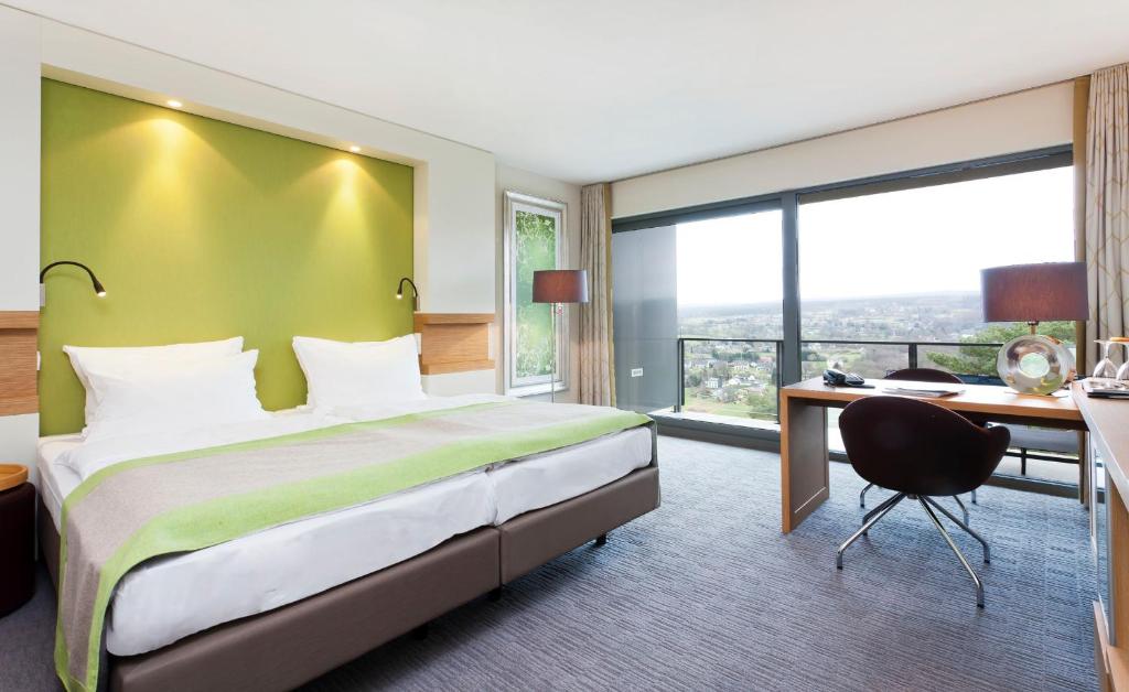 Postel nebo postele na pokoji v ubytování Silva Hotel Spa-Balmoral