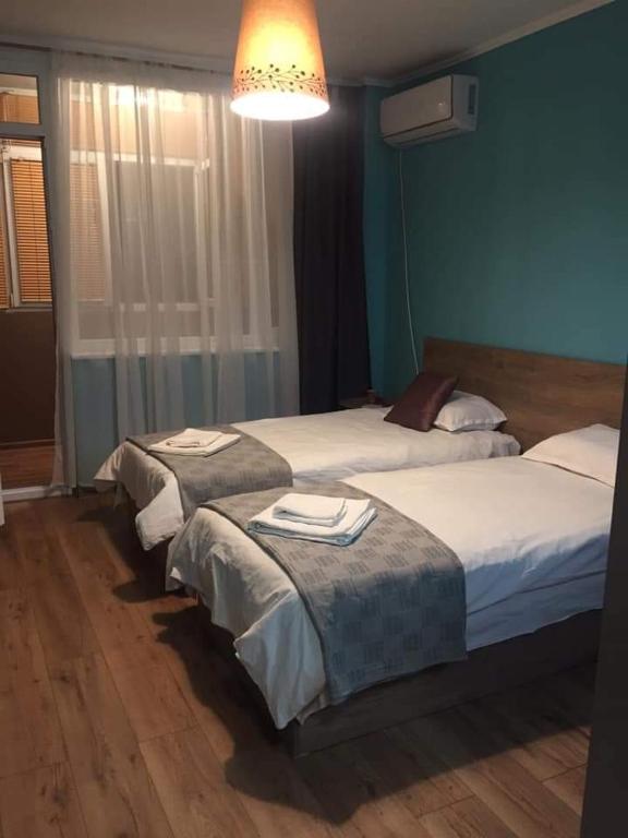 Postel nebo postele na pokoji v ubytování Center