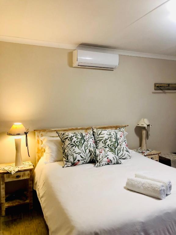 Postel nebo postele na pokoji v ubytování Rolbos Accommodation