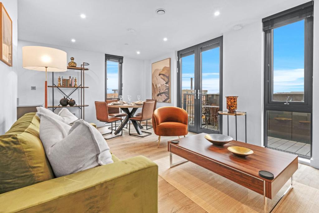 a living room with a couch and a table at Apartment 47 with Free Secure Parking and Onsite Gym in York