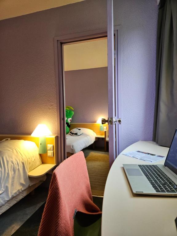 Postel nebo postele na pokoji v ubytování Hotel Bonanite