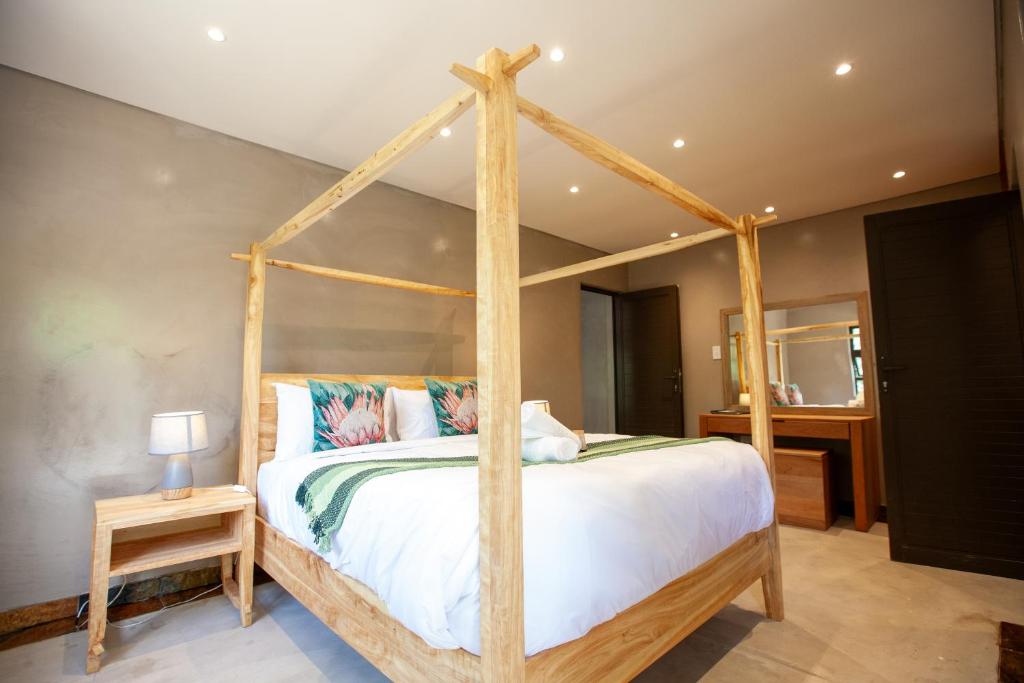 Voodi või voodid majutusasutuse Kruger Adventure Lodge toas