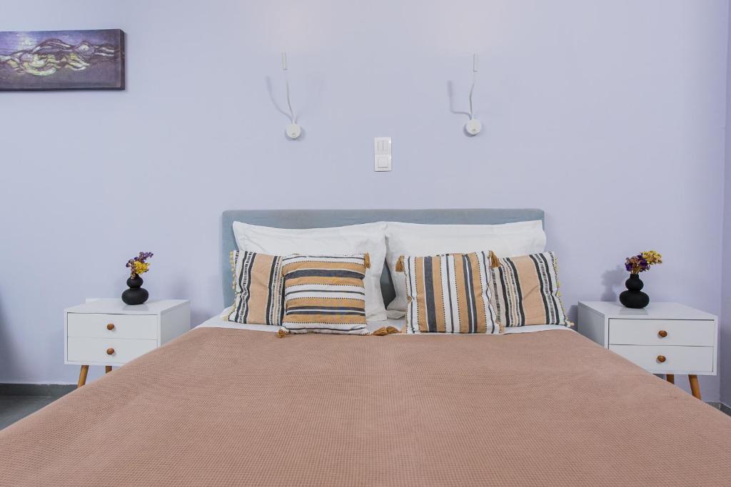 Postel nebo postele na pokoji v ubytování GIN Wellness Hotel