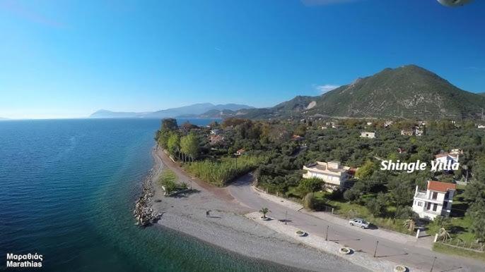 an aerial view of an island in the water at Nafpaktos Shingle Villa in Nafpaktos