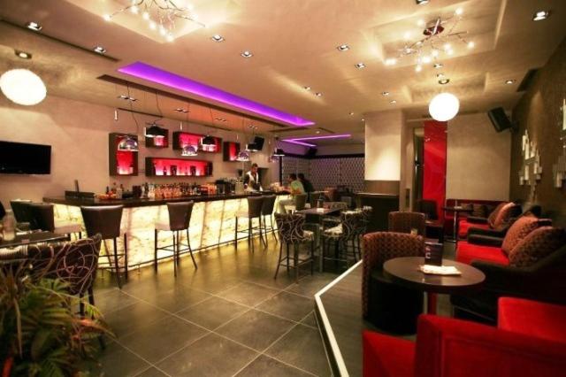 TV a/nebo společenská místnost v ubytování Hotel Aheron