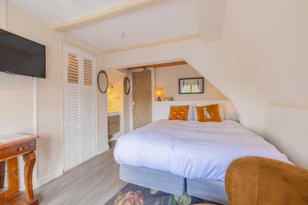 Postel nebo postele na pokoji v ubytování LOT Hotel