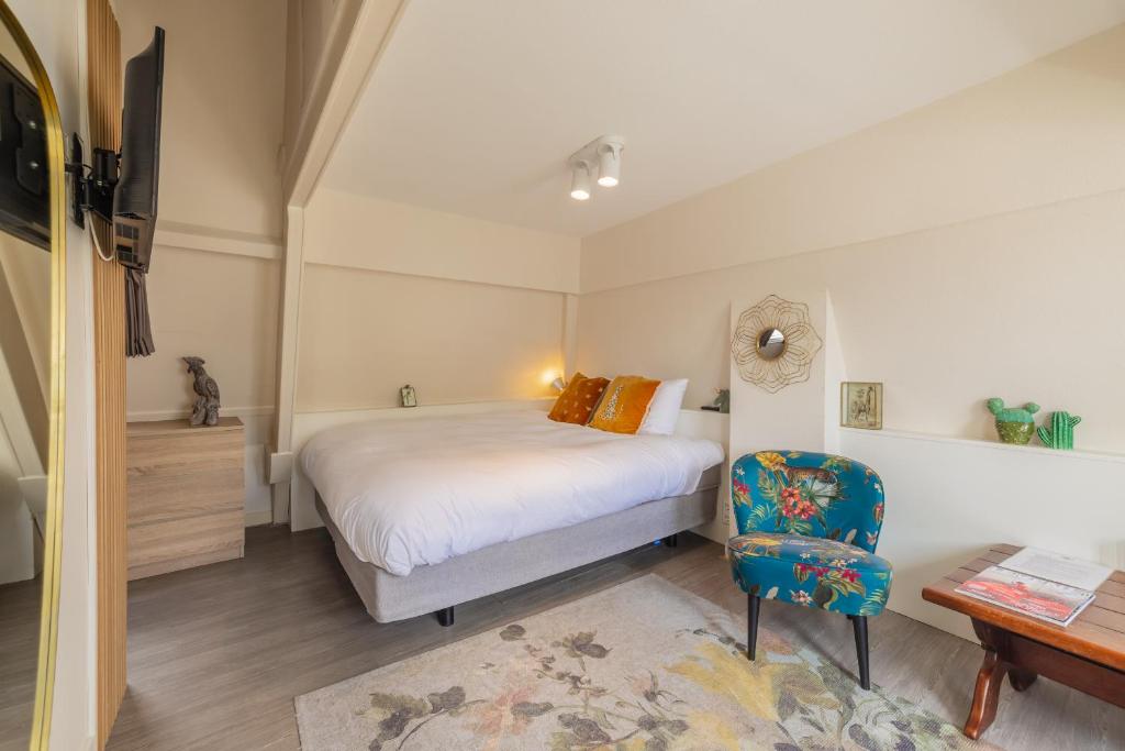 Postel nebo postele na pokoji v ubytování LOT Hotel