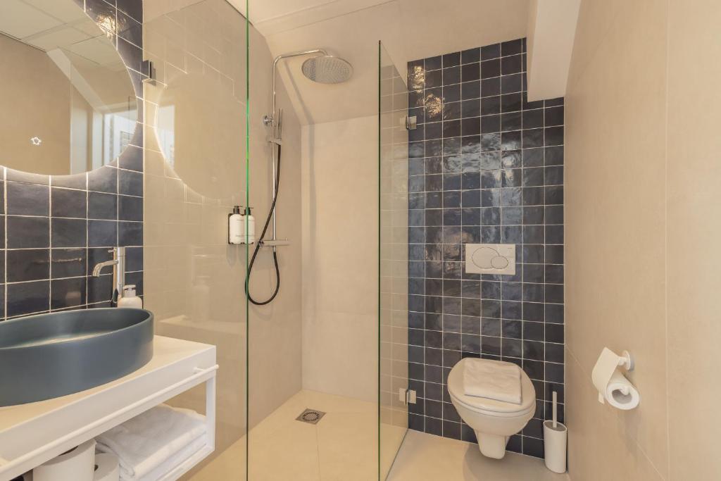 Een badkamer bij City Hotel Rembrandt