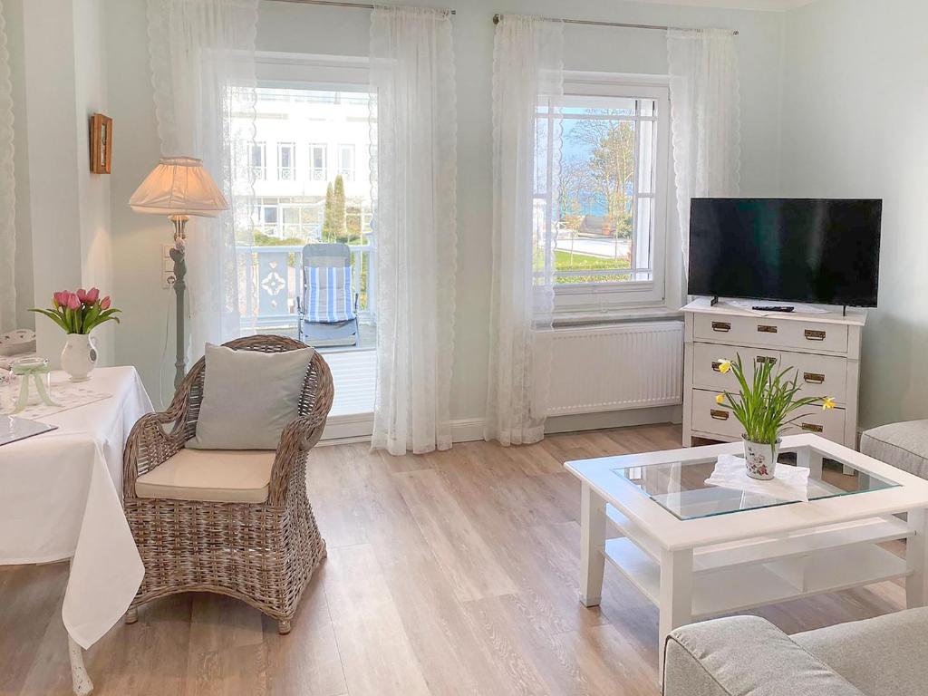 TV a/nebo společenská místnost v ubytování Haus Anholt