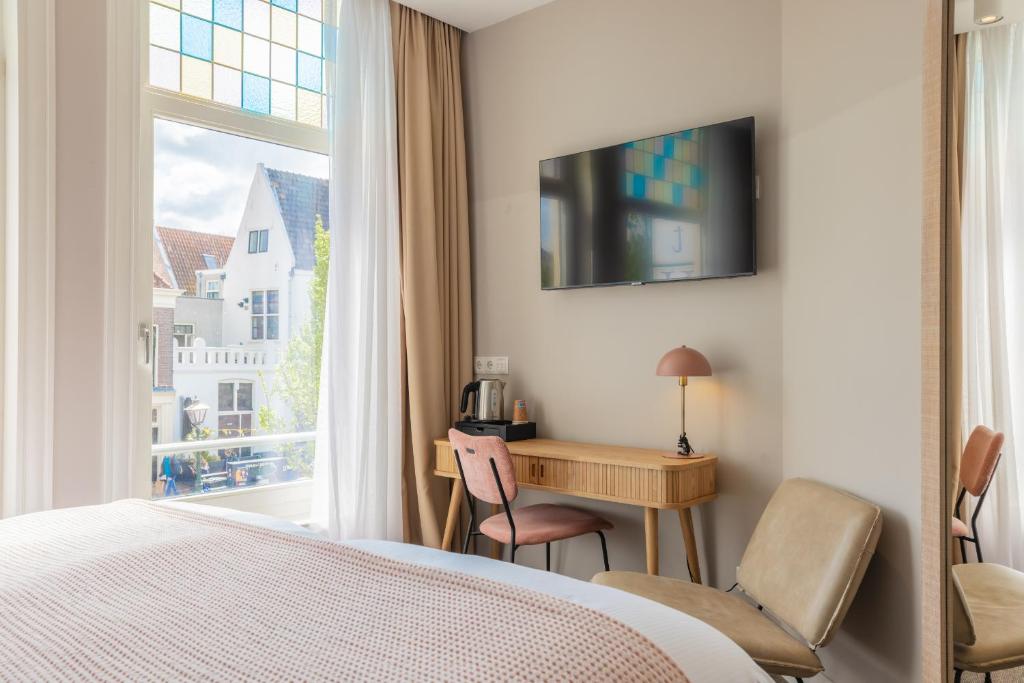 Een TV en/of entertainmentcenter bij City Hotel Rembrandt
