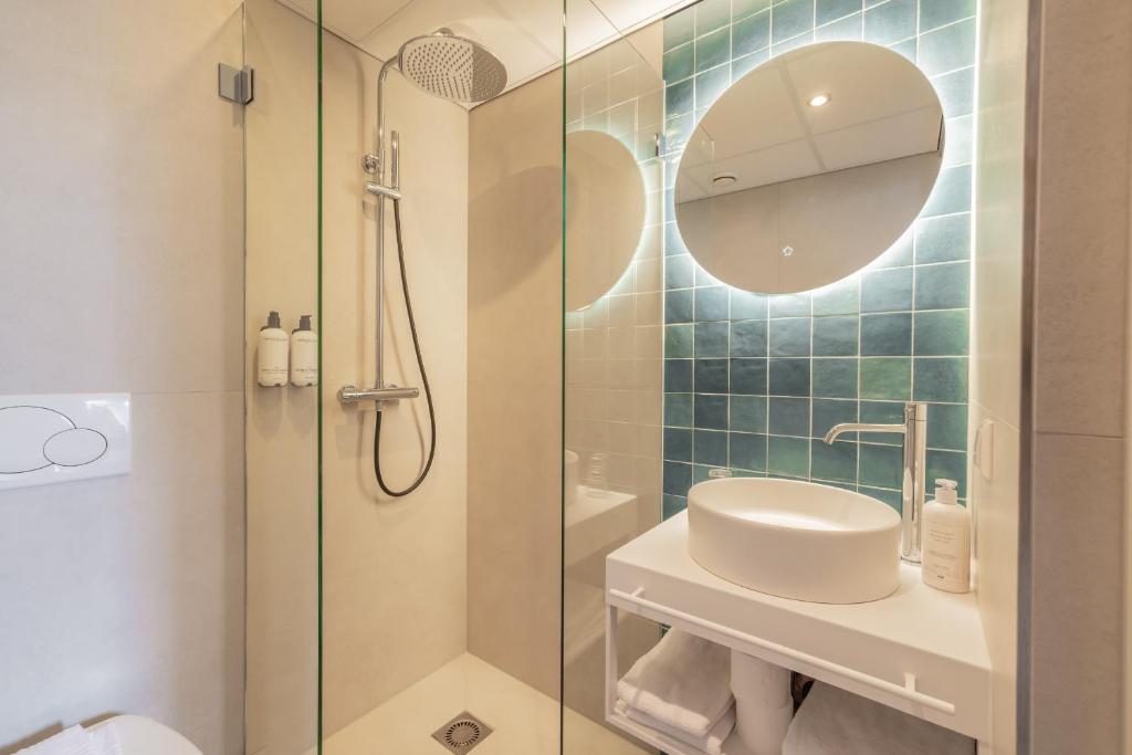Een badkamer bij City Hotel Rembrandt