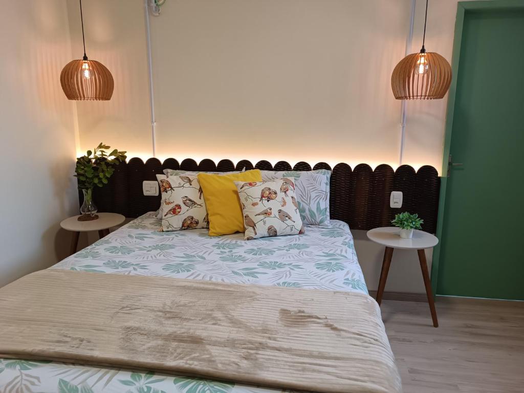 En eller flere senge i et værelse på Hospedagem do Mathe