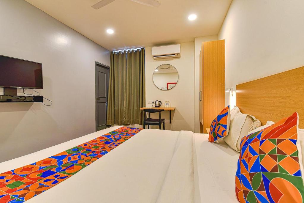 Postel nebo postele na pokoji v ubytování FabHotel NY Townhouse
