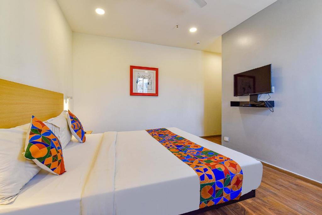 Postel nebo postele na pokoji v ubytování FabHotel NY Townhouse