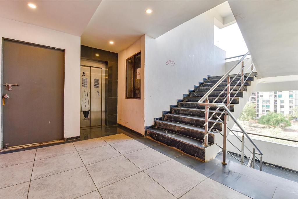 Fotografie z fotogalerie ubytování FabHotel NY Townhouse v destinaci Ahmadábád