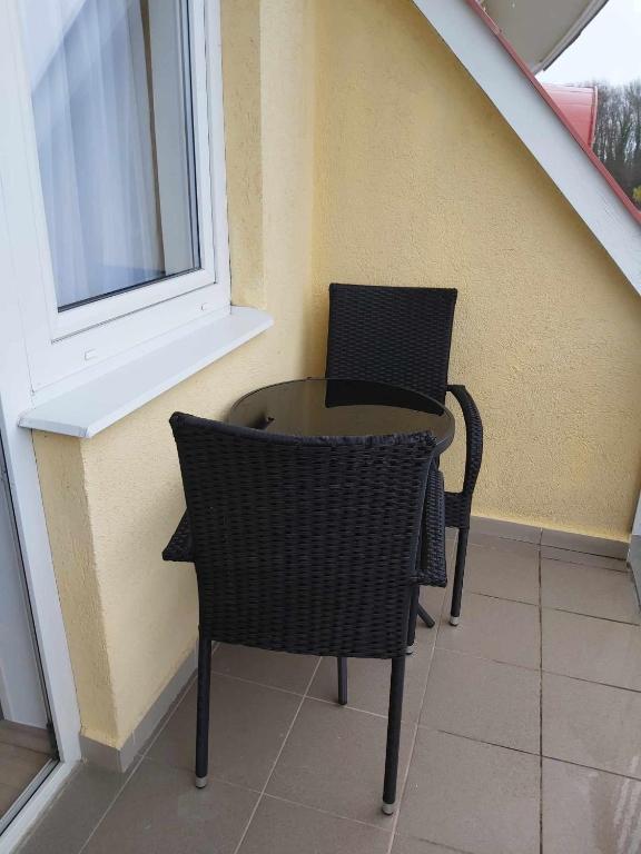 Istumisnurk majutusasutuses D&D Wellness Apartmanok - Dávid Wellness Apartman