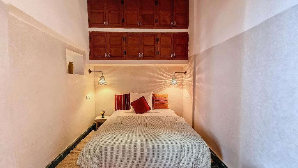 Postel nebo postele na pokoji v ubytování Riad Chambres D'Amis Marrakech