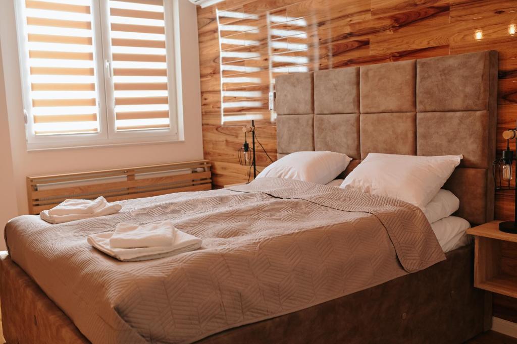 Postel nebo postele na pokoji v ubytování A-apartmani