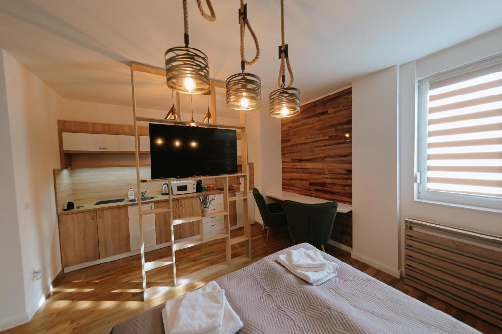 Postel nebo postele na pokoji v ubytování A-apartmani