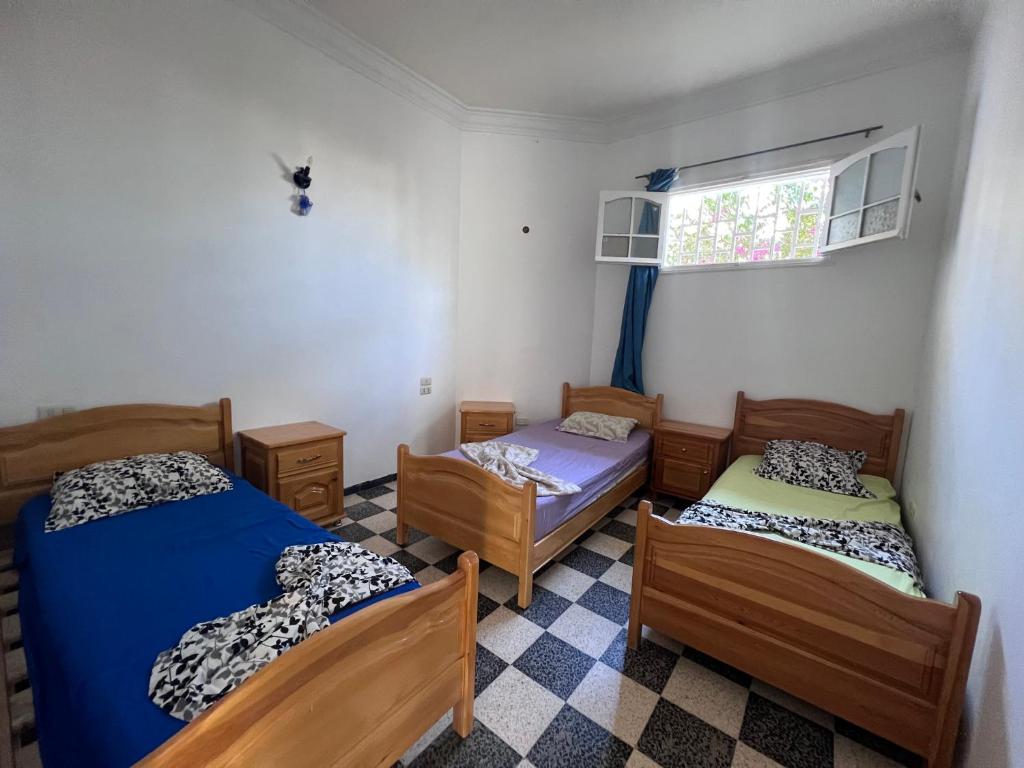 Postel nebo postele na pokoji v ubytování App s+2 RDC