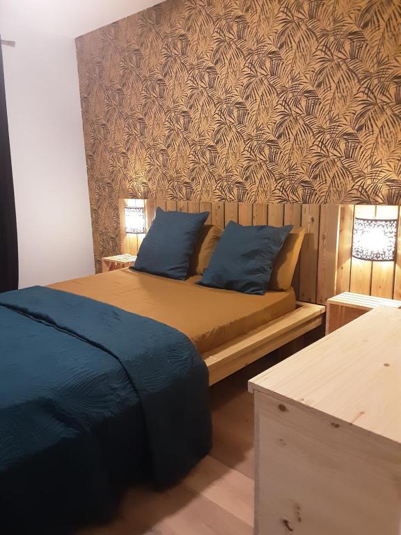 Postel nebo postele na pokoji v ubytování Les Fauvettes